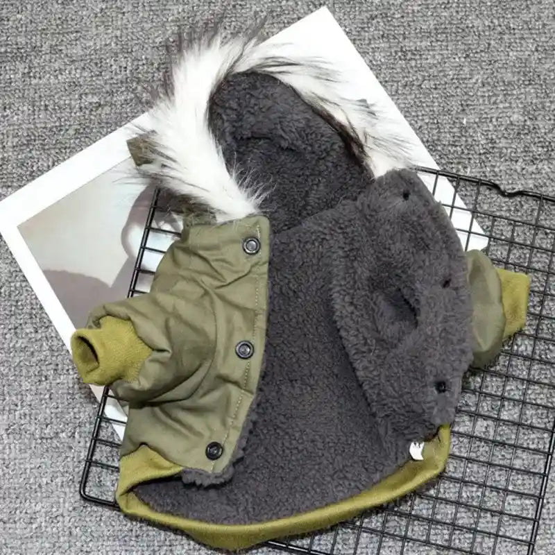 Open green winter dog coat with fleece lining.