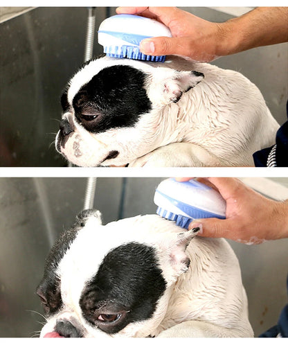 Dog being bathed with blue pet bath brush