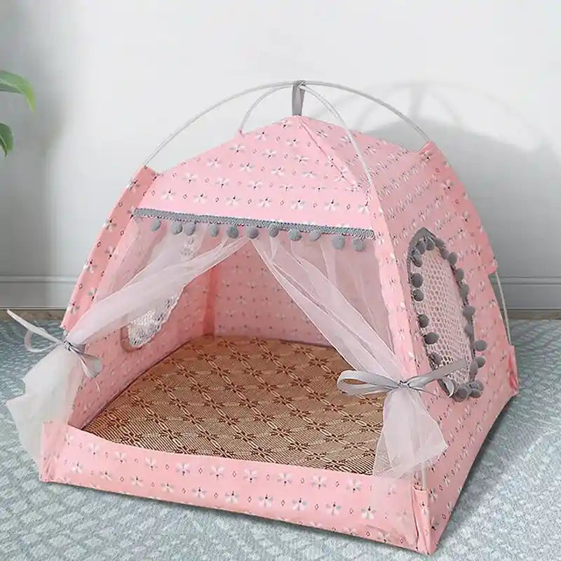 Pink cat tent bed with mesh windows and pom-pom trim