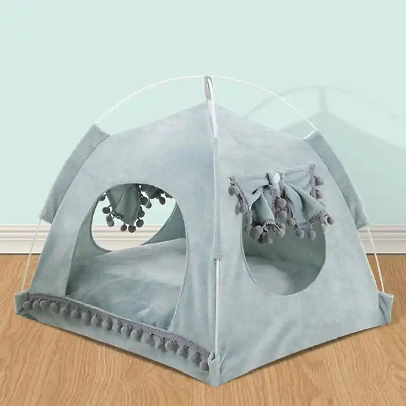 Light blue cat tent bed with pom-pom trim and side window