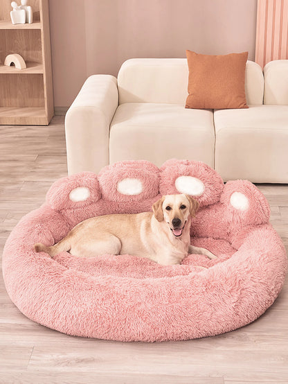 Labrador on pink plush dog sofa bed