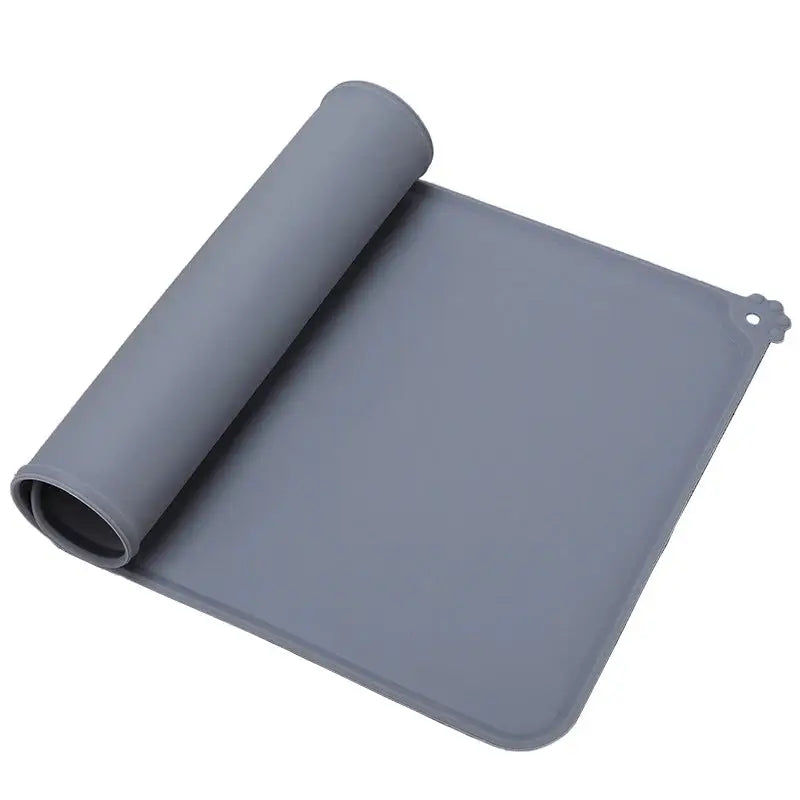 Gray silicone dog cat bowl mat rolled up