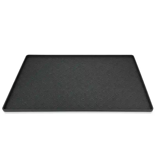 Black silicone pet feeding mat with paw print design