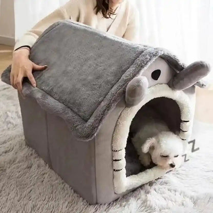 Person adjusting gray soft dog bed with sleeping pet inside.