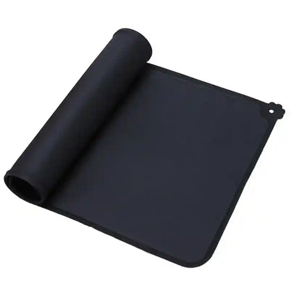 Black silicone dog cat bowl mat rolled up