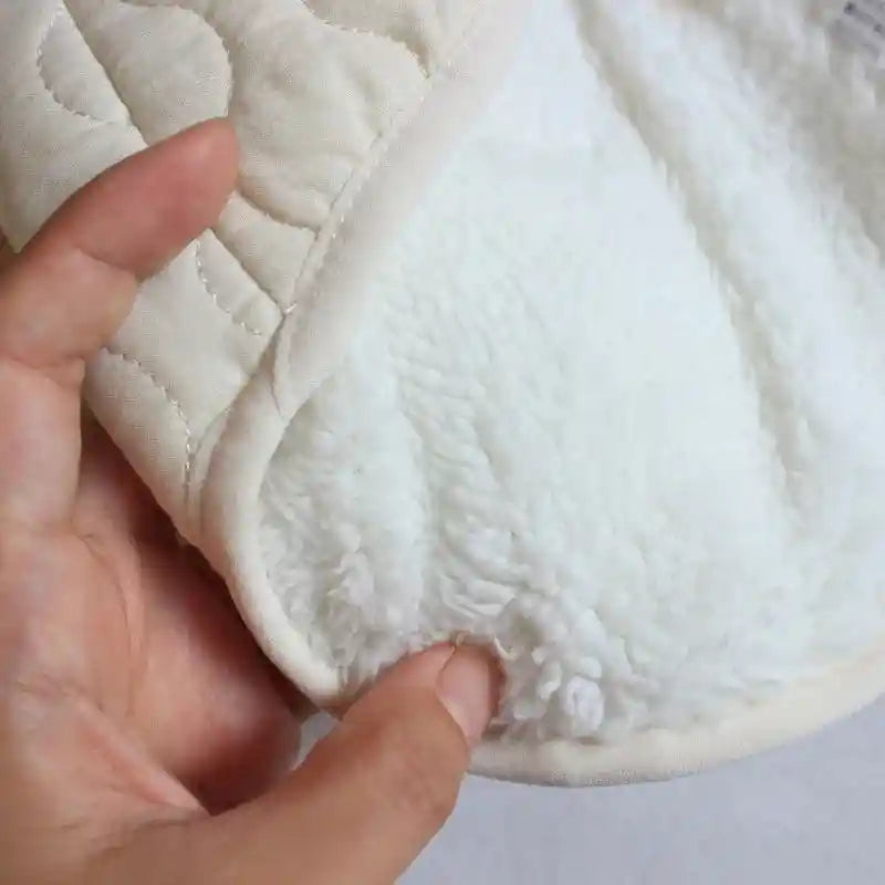 Close-up of soft fleece lining in beige dog vest