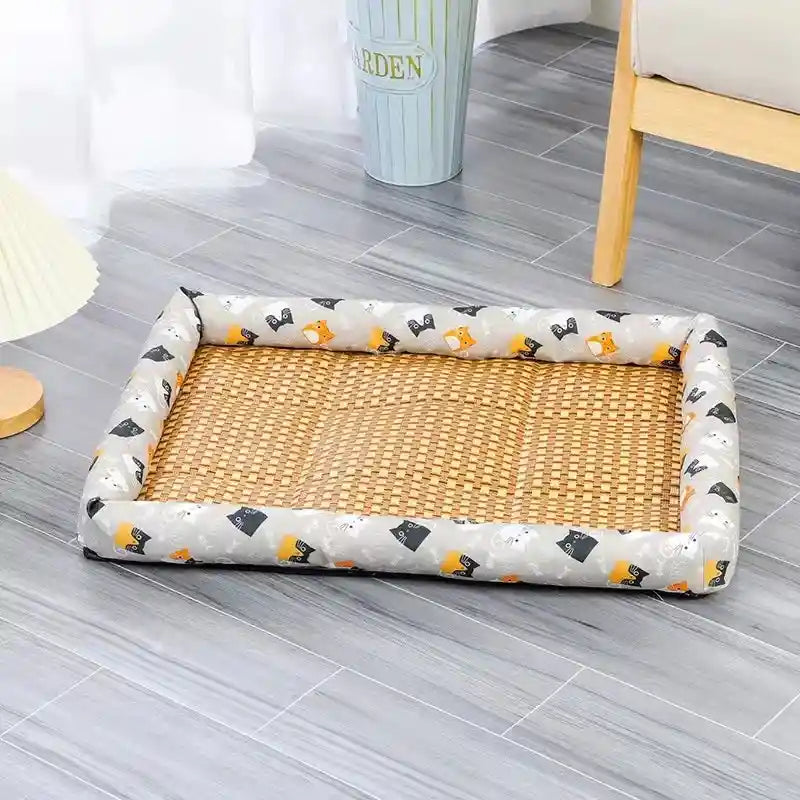 Empty rattan pet bed with cat pattern